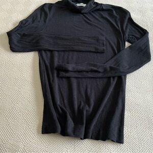 Woman’s Black Turtleneck Sweater